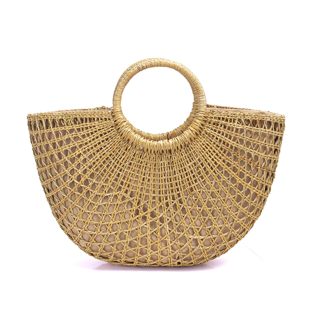 Exquisite Hollowed-Out Straw Basket Bag.